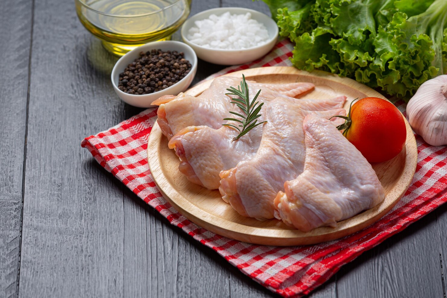 raw chicken wings dark wooden surface 1150 43963